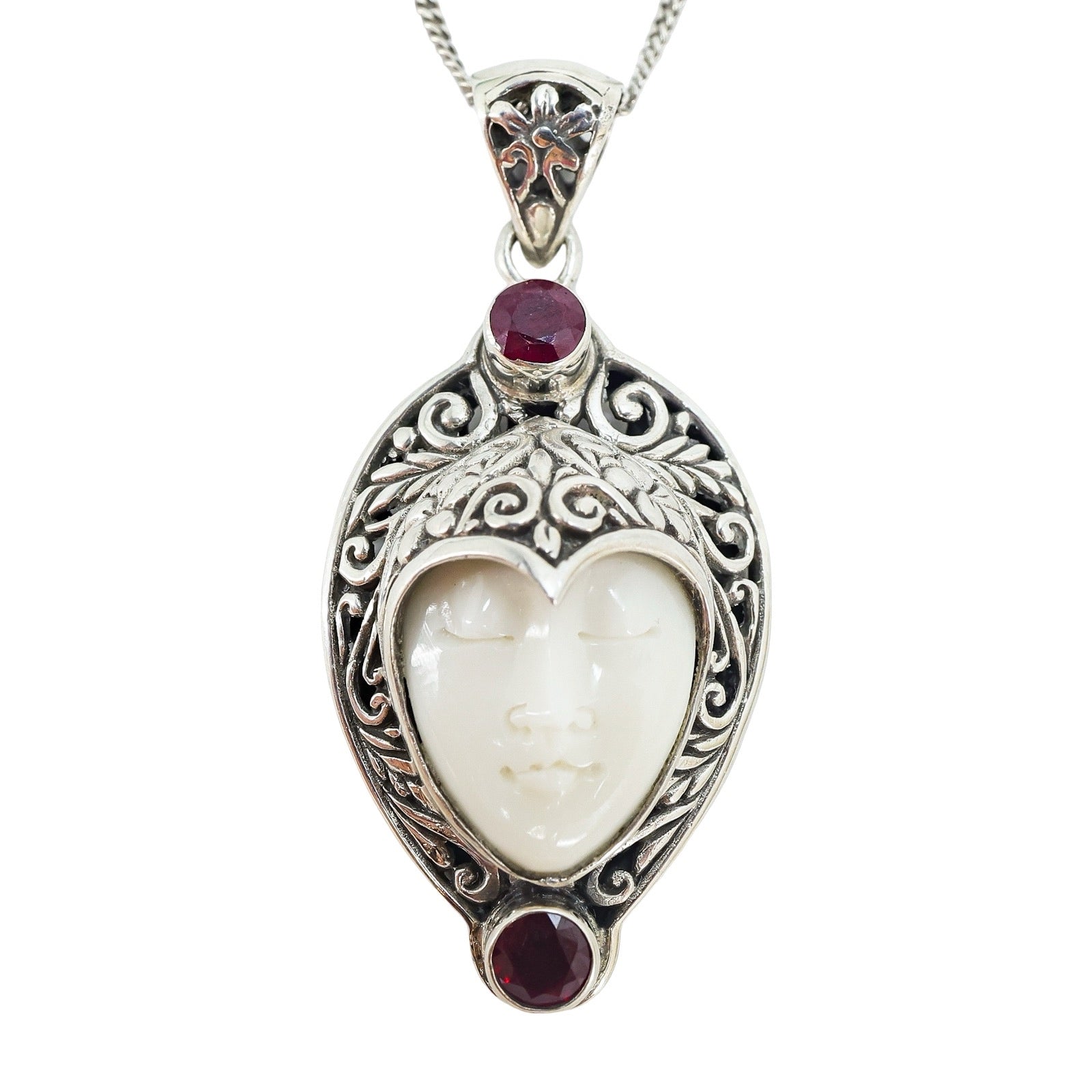 White Coral Carved Goddess Face And Ruby Pendant Necklace In Sterling Silver